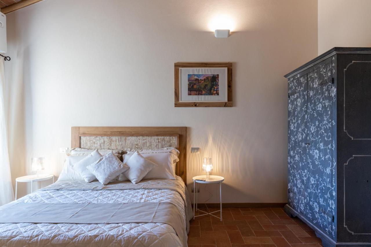 Il Castro Luxury Apartments 圣吉米纳诺 外观 照片